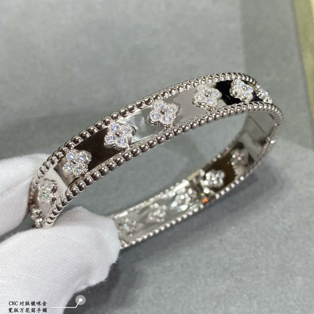 Van Cleef & Arpels Gold and Silver Flower Pattern Bracelets